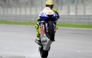 Motorcycle rider race track helmet 3 - his head and a helmet free wallpaper