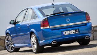 Blue car parked road stone - a blue car free wallpaper