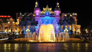 Fountain building clock night lights - a building in the background free wallpaper