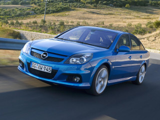 Blue car driving road hillside 2 - constant permeke free wallpaper