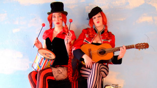 Costumed women guitars drums sitting - costume free wallpaper