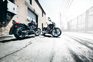 Two motorcycles street building fence - product photo free wallpaper