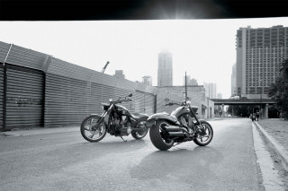 Motorcycles parked road fence building - annie leibovitz free wallpaper