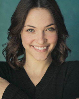 Smiling woman arms crossed black - daphne mcclure free wallpaper