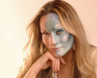 Blue face paint woman posing - weta digital free wallpaper