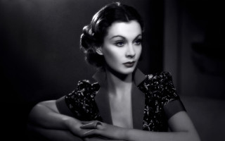 Woman black dress arms crossed 2 - doris blair free wallpaper
