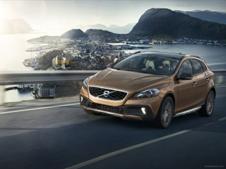 Brown volvo car road water - arvid nyholm free wallpaper