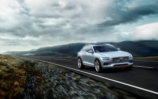 Silver volvo car driving mountains - panfuturism free wallpaper for desktop