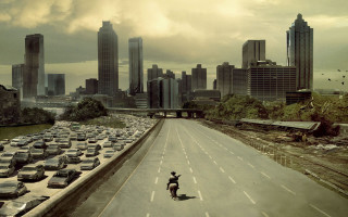 Skateboarder ruins cityscape sunset tower - apocalyptic free wallpaper