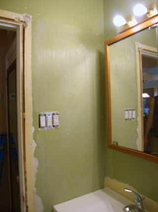 Bathroom sink corner mirror person - a sink and a mirror free wallpaper