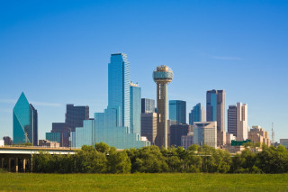 City skyline tower grassy field - dennis ashbaugh free wallpaper for desktop