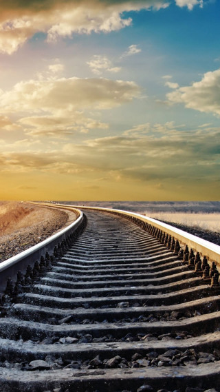 Train track sunset clouds mountain - a sun free wallpaper