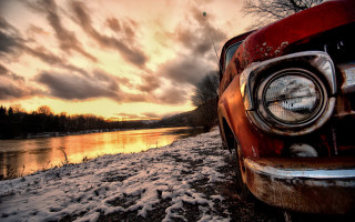 Red car sunset lake cloudy - a red car free wallpaper