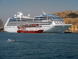 Cruise ship man small boat - stuckism free wallpaper