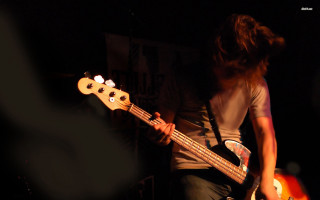 Man playing bass guitar dark - alex petruk ape free wallpaper