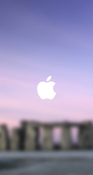 Blurry apple logo building sky - a tilt shift photo free wallpaper