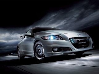 Silver car driving cloudy sky - a silver car free wallpaper