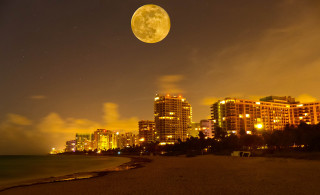 Full moon city night beach - over a city free wallpaper