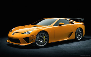 Yellow sports car dark room 3 - a yellow sports car free wallpaper