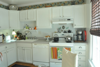 Kitchen white cabinets stove window - a white chair free wallpaper