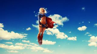 Woman bikini flying red cape - cloud behind her free wallpaper