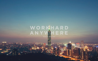 City skyline green skyscraper night - international typographic style free wallpaper for desktop