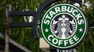 Starbucks sign building trees background - the side of a building free wallpaper