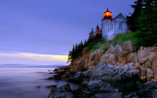 Lighthouse rocky cliff dusk water - beautiful landscape free wallpaper
