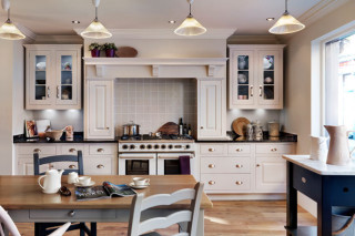 Kitchen table chairs stove oven - a window in the background free wallpaper