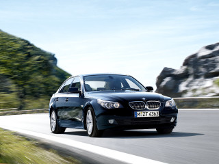 Black car driving mountain range - bernt tunold free wallpaper