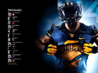 Football player glove ball numbers - a football player holding free wallpaper