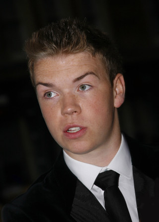 Young man suit tie serious - his face and shoulders free wallpaper