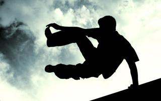 Man skateboard trick air feet - a skateboard in the air free wallpaper