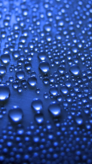 Water droplets blue surface bokeh 3 - a black border free wallpaper