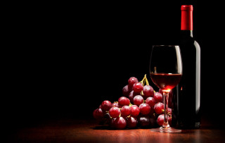 Wine glass bottle table grapes - a glass of wine and a bottle of wine free wallpaper