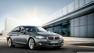 Silver car driving street building 2 - bernt tunold free wallpaper