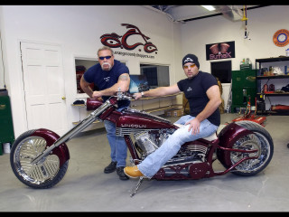 Two men motorcycle garage standing - a man free wallpaper