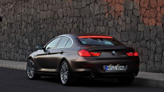 Brown car stone wall street - a brown car free wallpaper