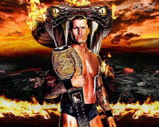 Man wrestling suit holding fire - his hand and a fire free wallpaper