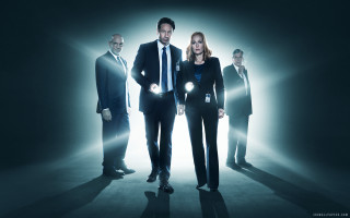Group people dark room light 3 - a poster free wallpaper for desktop