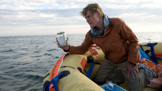 Man sitting raft cellphone beer - a raft free wallpaper