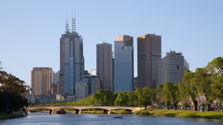 River bridge boat city background - the water and a city in the background free wallpaper