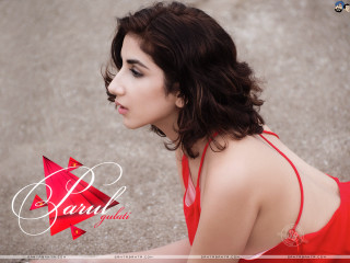 Woman red dress sitting looking - a red star free wallpaper