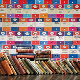Stack of books wooden table - a wall free wallpaper