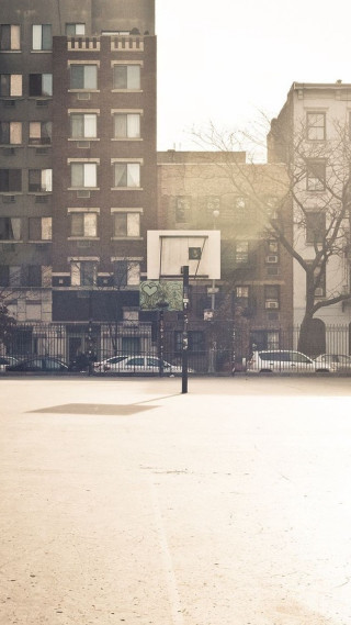 Person street corner basketball hoop - cinematic photography free wallpaper