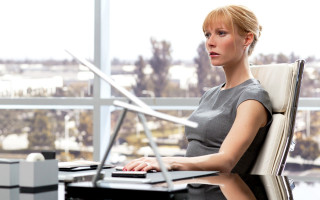Woman sitting chair laptop desk - tachisme free wallpaper