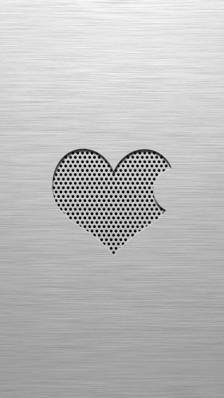 Heart shaped hole metal surface - free valentines wallpaper
