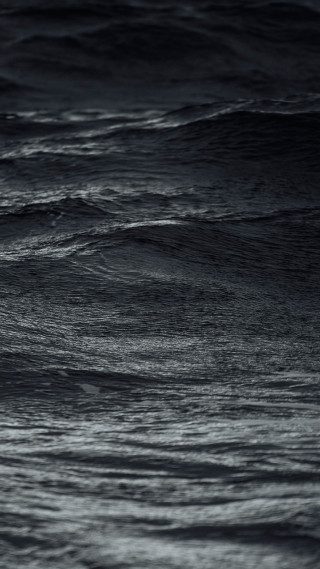 Person riding surfboard wave ocean 2 - cinematic photography free wallpaper