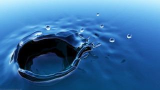 Blue liquid water bubbles floating - a blue liquid free wallpaper