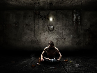 Man sitting dark room clock 5 - the wall behind free wallpaper